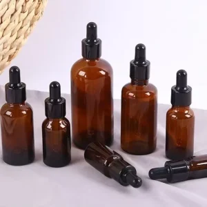 Custom Logo Printing 30ml 50ml 100ml Amber Dropper Bottles for Light Sensitive Essential Oils Skincare