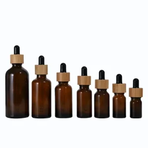 Custom Logo Printing Amber Glass Dropper Bottles with Bamboo Caps 5ml 10ml 30ml 50ml Refillable Vials for Essential Oils Serums