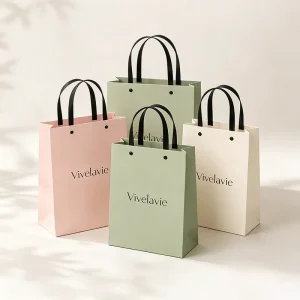 Factory Custom Luxury Paper Packaging Bag Personalized Logo Ribbon Handle Gift Bag For Cosmetics Apparel Retail