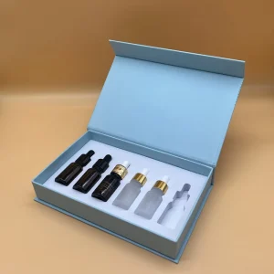 Magnetic Flip-Top Book-Shaped Rigid Cardboard Cosmetic Skincare Gift Box Gold/Silver Foil Four-Color Printing EVA/Pearl Cotton